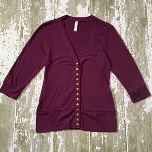 A purple cardigan